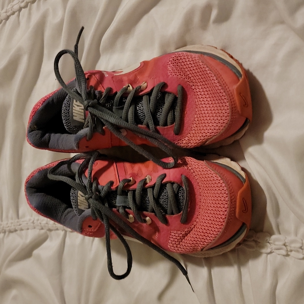 Pink Nike running shoes